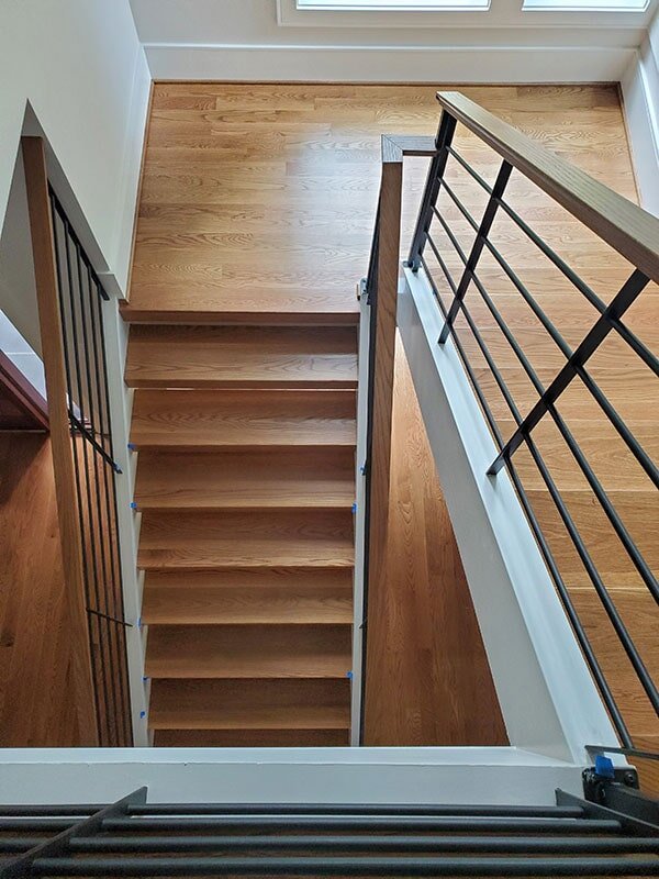 Hardwood staircase in Durham, NC from Bell's Carpets & Floors