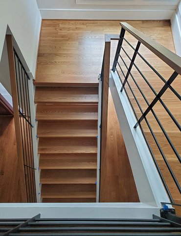 Hardwood staircase in Durham, NC from Bell's Carpets & Floors