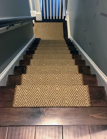 Hardwood stairs with stair runner in Cary, NC from Bell's Carpets & Floors